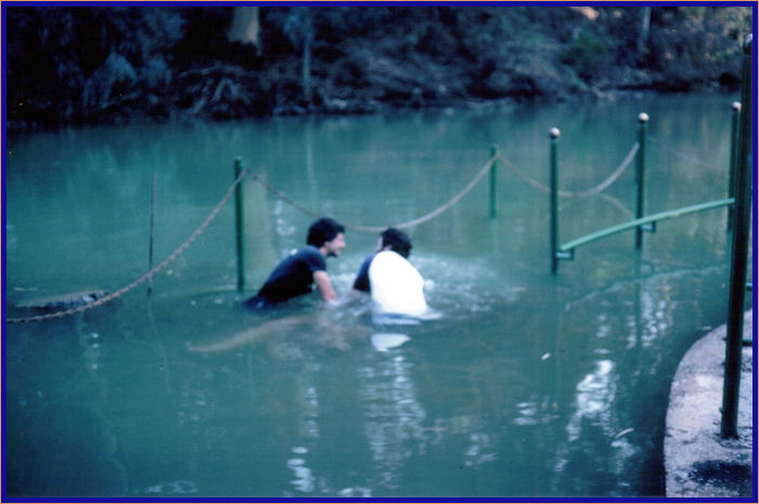 My pastor on the right and another pastor friend did me the honor of baptizing me